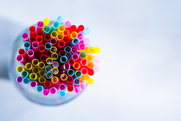 Colorful drinking straws as background