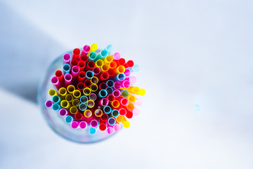 Colorful drinking straws as background
