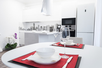 Modern kitchen interior. Table served for dinner