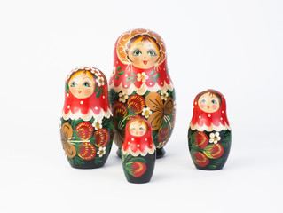Travel around the world for your colorful life .Enjoy the funny trip journey .Top view for copy space some idea your create destination .object  cute  ,  Set of matrioshka dolls on white background.