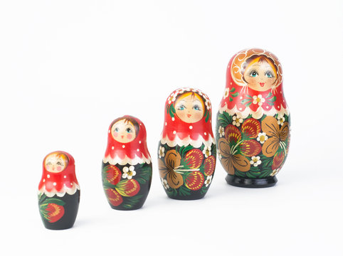 Travel around the world for your colorful life .Enjoy the funny trip journey .Top view for copy space some idea your create destination .object  cute  ,  Set of matrioshka dolls on white background.