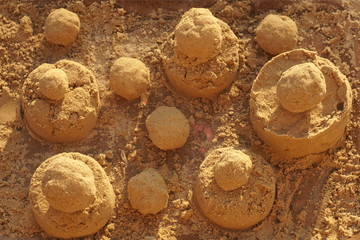 sand cakes from children's sandbox