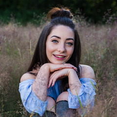 Square crop of Alex in a meadow