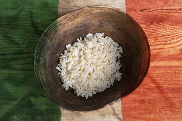 Poverty concept, bowl of rice with Italy flag