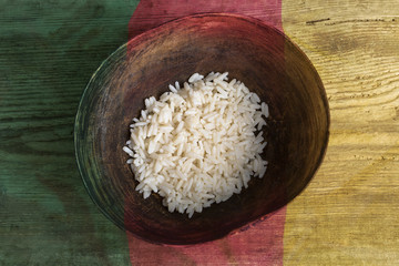 Poverty concept, bowl of rice with Cameroon flag