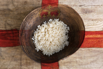 Poverty concept, bowl of rice with Northern Ireland flag