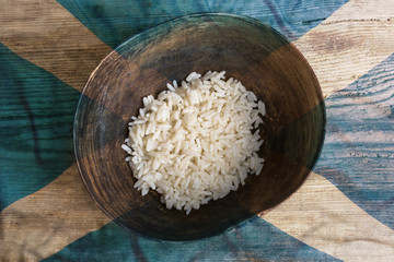 Poverty concept, bowl of rice with Scotland flag