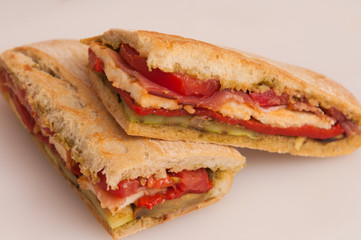 two sandwiches with colored vegetable