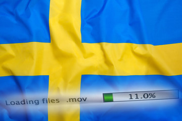 Downloading files on a computer, Sweden flag