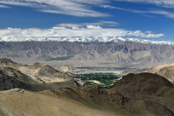 Mountains in Ladakh in India from the ridge to the highest mountain pass you can reach by car.