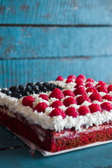 Cake topped with berries to make an American flag