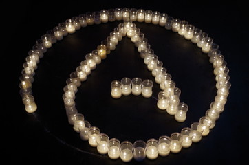 Atheism symbol made with candles