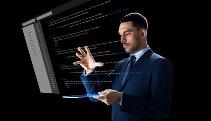 businessman with tablet pc and virtual coding