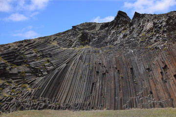 Balsalt columns at the base of Pico de Ana Ferreira mountain in Porto Santo, Portugal