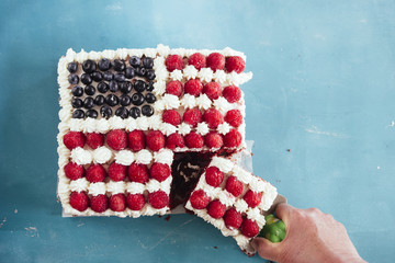 Cake topped with berries to make an American flag