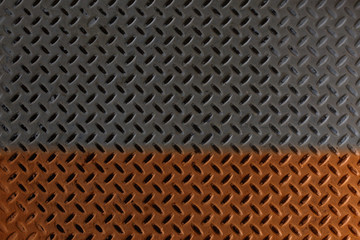 Background of metal diamond plate in silver color.