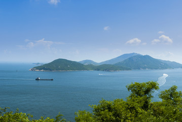 Fototapeta na wymiar Container ship in Chinese sea, Hong Kong.