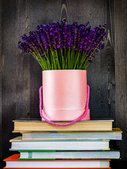 Pink lavender pot on books