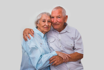 The elderly couple on studio background