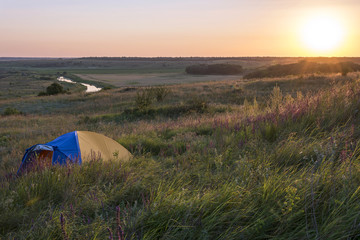 On the hill there is a tent