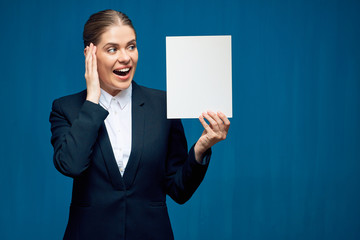 Surprised business woman holding sign card.
