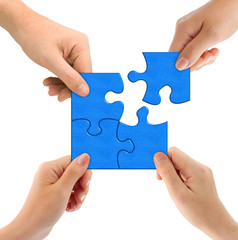 Hands and puzzle