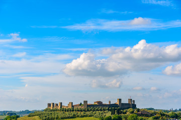 Fototapeta na wymiar View of the surrounding wall of the beautiful medieval town of Monteriggioni in Tuscany, Italy