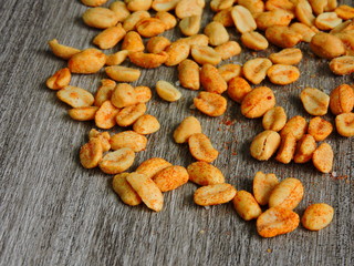 Peanuts with spices and chili. Close up.