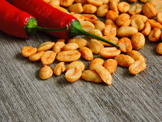 Peanuts with spices and chili. Fresh chilli pepper. Macro. Copy space.