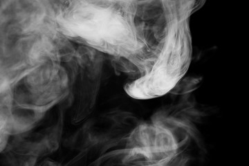 close up of steam smoke on black background.