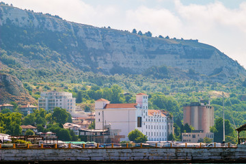 Obraz premium Cityscape of balchik town, houses and buildings on shore of black sea coast, Bulgaria