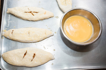 Dough products with filling. Lie on a baking sheet
