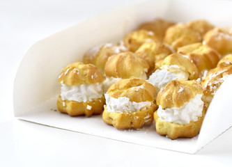 Many donuts in a white box