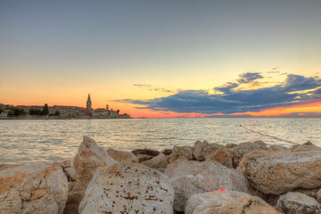 Porec skyline and sea at sunset