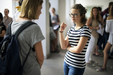 Students women standing talking on break