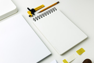 Closeup of paper stationery isolated on white table