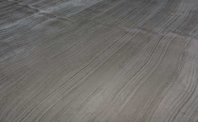 Surface on concrete road under construction.