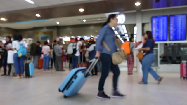 Time Lapse. Passenger, traveler moving and walking in Airport terminal hall, travel journey concept, blur abstract background