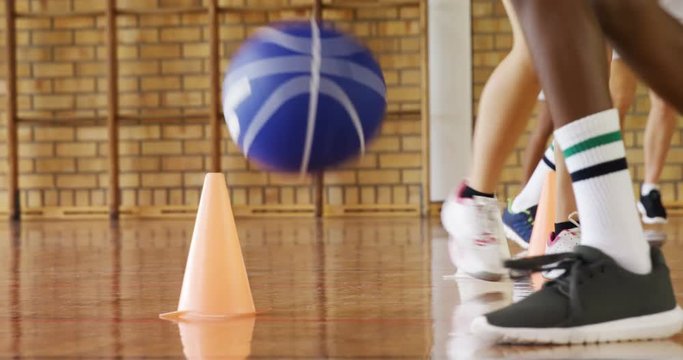 Low section of high school kids playing basketball