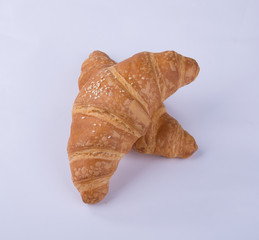 croissant or tasty croissant on the background.