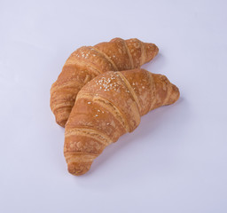 croissant or tasty croissant on the background.