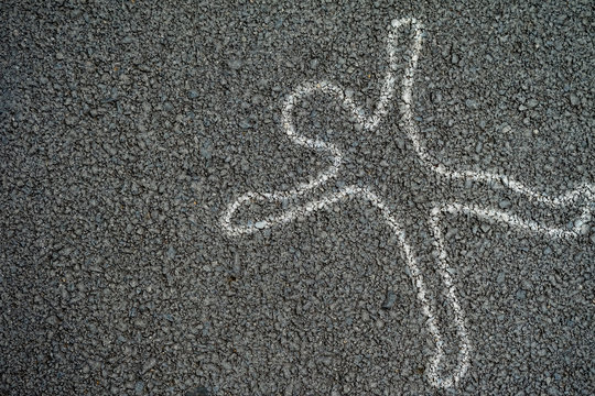 White outline of human body at the accident on the Road