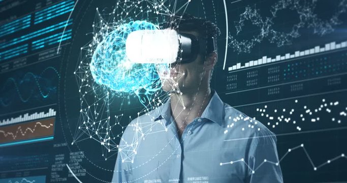 Man using virtual reality headset and futuristic screen