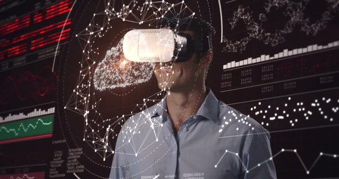 Man using virtual reality headset and futuristic screen