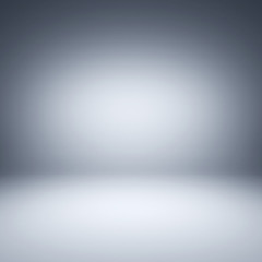 Gray spotlight background. Empty gray studio.
