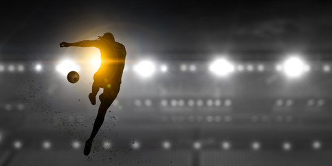 Soccer player in action . Mixed media © Sergey Nivens