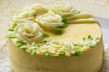 Butter yellow cake with marzipan roses.