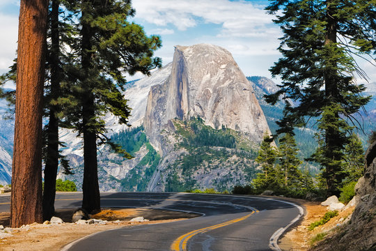 The road leading to Glacier Point in Yosemite National Park, California, USA with the Half Dome in the background.