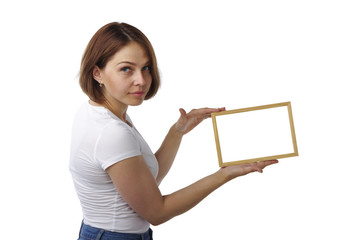 Beautiful girl holds a light wooden frame