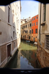 Fototapeta na wymiar colorful houses and canal in Venice, Italy
